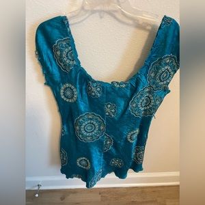 Off shoulder satin embroidered top size M or L.